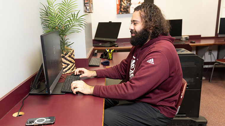 Student using a laptop.