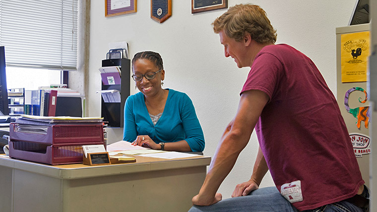 An academic advisor working with a Missouri State student. 