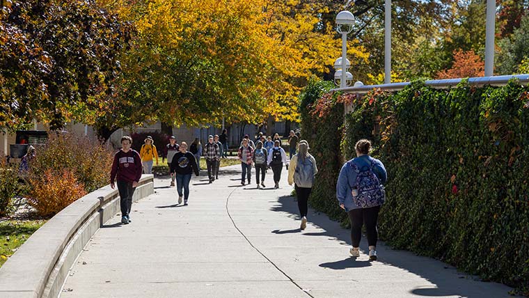 MIssouri State students walking to class on the east side of Plaster Student Union.