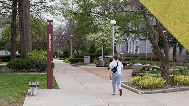 Missouri State student walking on campus.