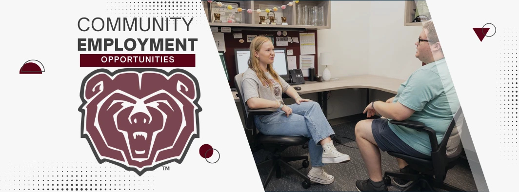 Two people talk in office