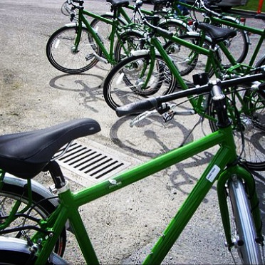 Bicycles in a bike rack used for the Green Bicycle program.