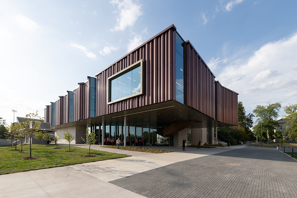 Image of the exterior of the Judith Enyeart Reynolds Performing Arts Complex on a sunny day