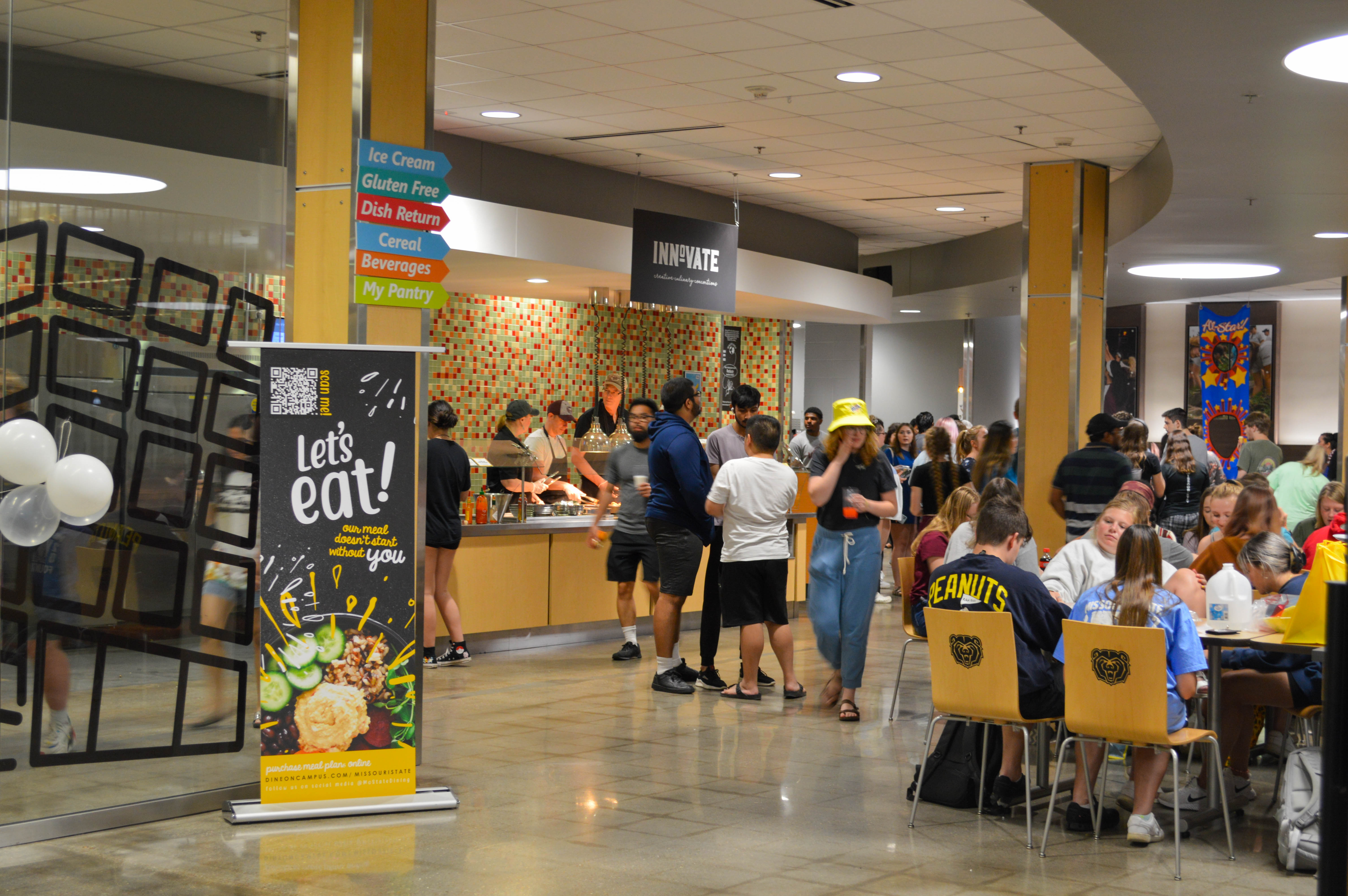 Students gather in a dining hall