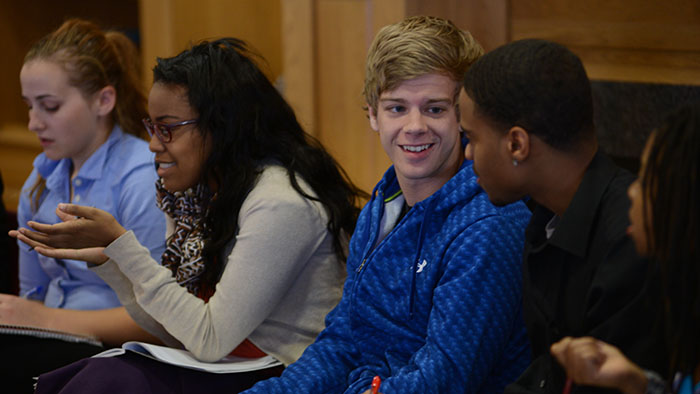 students sit in a classroom