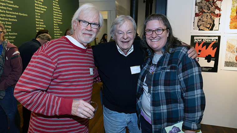 Alumni, retired and current faculty attending the xhibition reception for Legacy: Celebrating Art + Design.