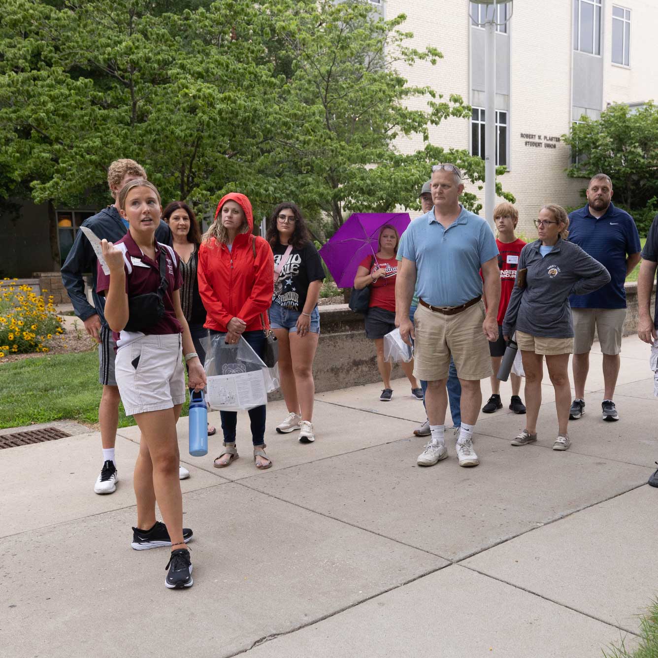 An MSU tour guide provides potential students and families with information about the MSU campus.